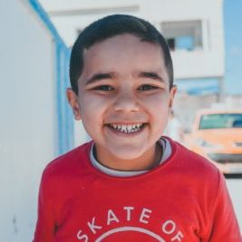 smiling boy outdoors